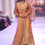 Peach Angrakha Ensemble with Gold Tissue Gharara