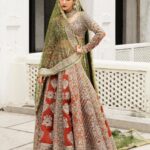 Rust Bridal Lehenga Choli with Dual Dupattas and Luxurious Hand Embellishments