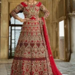 Embroidered Silver and Gold Gown with Golden Raw Silk Lehenga and Fawn Net Dupatta