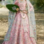 Coral Pink Raw Silk Lehenga Choli with Jewelled Embellishments