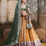 Black, Green, and Tangerine Festive Lehenga Ensemble