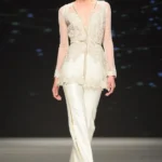 Mystical Ivory Peplum & Flared Trouser Suit